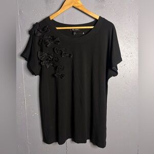 St. John Black shirt with Bow Embellishments.  Size medium